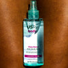 Bottle of USRX Glow Boost AHA Body Mist in Passionfruit Paloma 