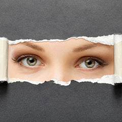 Unidentifiable woman with green eyes