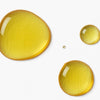 Lightweight, yellow droplets of Super C Brightening Serum which has a light citrus smell