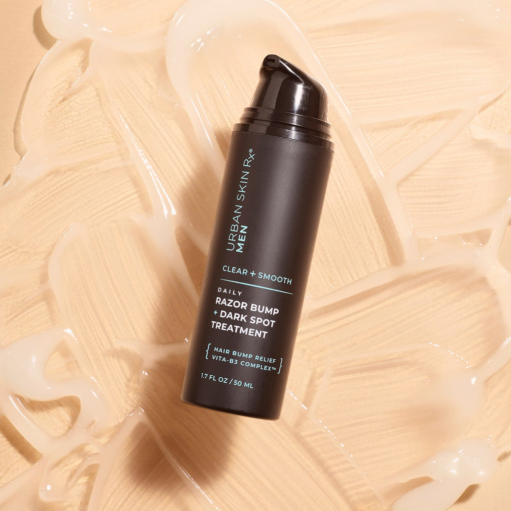 Bottle of Urban Skin RX Razor Bump + Dark Spot Treatment with swatches of product showing texture of cream